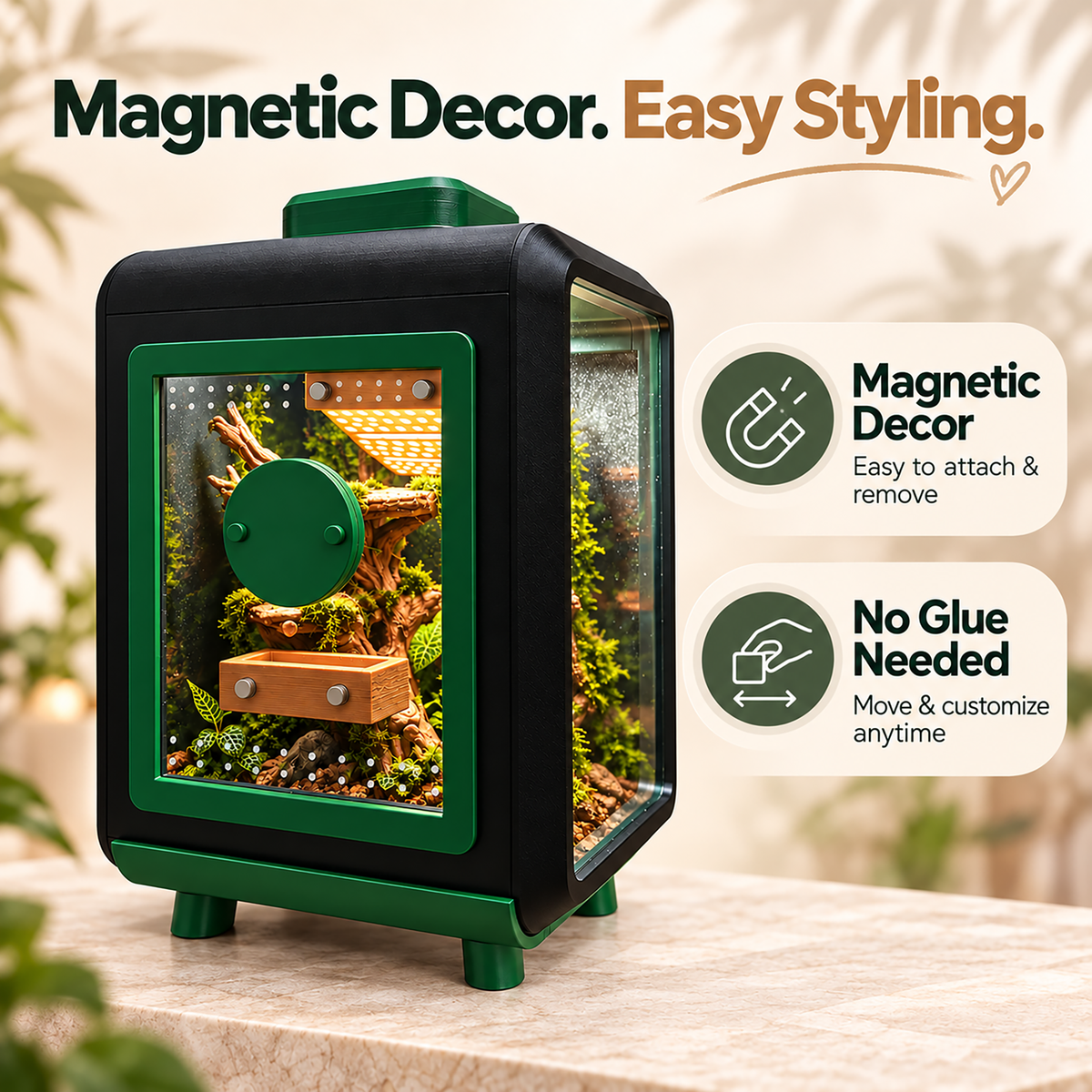 A magnetic pet terrarium with a black and green frame, acrylic front, and colorful natural wood and moss interior, shown on a tabletop with marketing text and callouts about magnetic decor and no glue needed.